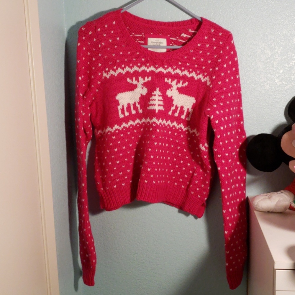 Pink reindeer sweater with hearts